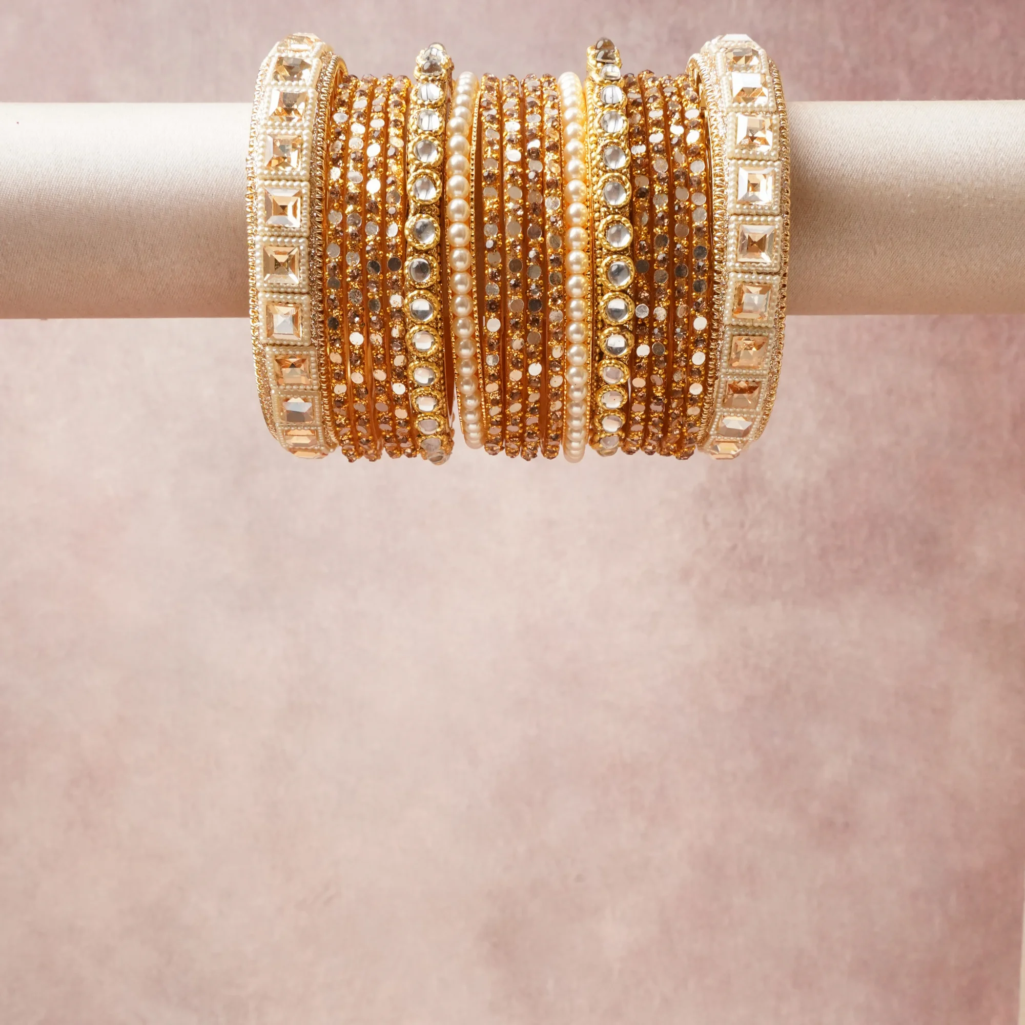 A grounding Gold forms the heart of the set, while touches of Cream, Clear, Champagne add charm.

A thoughtful composition of Gold-toned Metal, Pearls, Glass Stones, designed to feel complete without being heavy.
Each element layers seamlessly, creating a look that is refined, wearable and quietly striking.